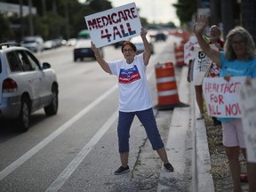 Marcia A. joins with other protesters against Republican senators who have not spoken up against Affordable Care Act repeal and demand universal, affordable, quality healthcare for all on July 24, 2017 in Fort Lauderdale, United States. (Photo by Joe Raedle/Getty Images)