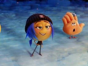 This image released by Sony Pictures shows characters, from left, Gene, voiced by T.J. Miller, Jailbreak, voiced by Anna Faris and Hi-5, voiced by James Corden in Columbia Pictures and Sony Pictures Animation's "The Emoji Movie." (Sony Pictures Animation via AP)