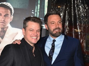 Actors Matt Damon (L) and Ben Affleck arrive for the world premiere of Warner Bros. 'Live By Night,' January 9, 2017 at the TCL Chinese Theater in Hollywood, California. (ROBYN BECK/AFP/Getty Images)