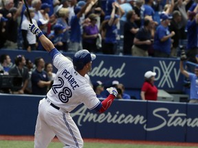 Steve Pearce of the Toronto Blue Jays homers to left field to defeat the Oakland A's at the Rogers Centre on July 27, 2017. (Veronica Henri/Toronto Sun/Postmedia Network)