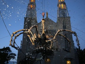 Kumo - a massive mechanical spider from La Machine - awoke atop of Notre Dame Cathedral in Ottawa Thursday evening to the delight of people who came to be part of the theatrical spectacle, which will run July 27-30 all over downtown as part of Canada 150 celebrations.