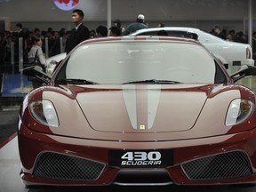A Ferrari 430 Scuderia sportscar is on display at the Beijing Auto Show on April 23, 2008. (PETER PARKS/AFP/Getty Images)