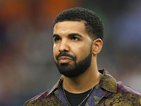 Drake looks on prior to the International Champions Cup soccer match between Manchester City against Manchester United at NRG Stadium on July 20, 2017 in Houston, Texas. (Aaron M. Sprecher/AFP/Getty Images)