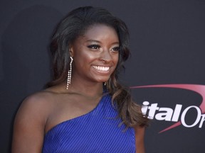 U.S. gymnast Simone Biles shared a video of herself on July 27, 2017, taken after she had surgery to have her wisdom teeth removed. (Jordan Strauss/Invision/AP/Files)