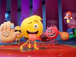 Hi-5 (James Corden), left, Gene (T.J.Miller) and Devil (Sean Hayes) with other emojis in Sony Animation's "The Emoji Movie."  (Sony Pictures Entertainment)