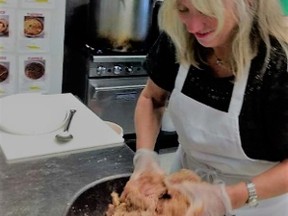 Food columnist Lindy Mechefske makes meatballs at Gino’s Pizza and Spaghetti in Amherstview. (Submitted photo)