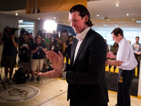 Nashville Predators' claps as he leaves a news conference at Bridgestone Arena in Nashville on July 28, 2017. (Andrew Nelles/The Tennessean via AP)