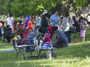 People gather in Springbank Park last summer for a community barbecue organized by  the London chapter of the Muslim Association of Canada and the Muslim Student Association at Western University to raise funds for the victims of the Fort McMurray fire.