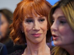 In this June 2, 2017, file photo, comedian Kathy Griffin, left, listens as her attorney Lisa Bloom speaks during a news conference in Los Angeles, to discuss the backlash since Griffin released a photo and video of her displaying a likeness of President Donald Trump's severed head. (AP Photo/Mark J. Terrill, File)