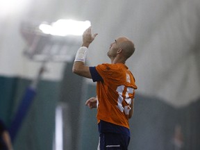 Toronto Argonauts' Ricky Ray spirals a ball upwards at the walk-through practice at Downsview Park in Toronto on July 27, 2017. (Jack Boland/Toronto Sun/Postmedia Network)