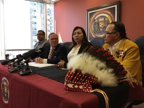 (Left to right) Ron Moniasm CEO of Northern Authority; Minister of Families Scott Fielding; Grand Chief Sheila North Wilson of Manitoba Keewatinowi Okimakanak (MKO); Chief Chris Baker, MKO Child and Family Services portfolio holder at a press conference on Friday, July 28, 2017 in Winnipeg in announce the Manitoba's government has lifted the order of administration and reinstated the board of the First Nations of Northern Manitoba Child and Family Services Authority to oversee First Nations child welfare agencies across the province. JASON FRIESEN/Winnipeg Sun/Postmedia Network