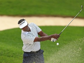 Vijay Singh of Fiji plays his shot on the ninth hole during the second round of the RBC Canadian Open at Glen Abbey Golf Club on July 28, 2017. (Vaughn Ridley/Getty Images)