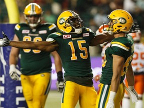 Edmonton's Vidal Hazelton (15) and Brandon Zylstra (83) celebrate scores two extra points after a touchdown during the second half of a CFL game between the Edmonton Eskimos and the BC Lions at Commonwealth Stadium in Edmonton on Friday, July 28, 2017.