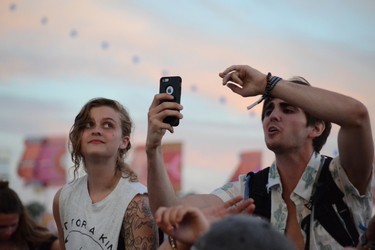 Making sure the best photos are being taken during the Cage The Elephant set on the first night of the 2017 Wayhome Music & Arts Festival. Patrick Bales/Postmedia Network