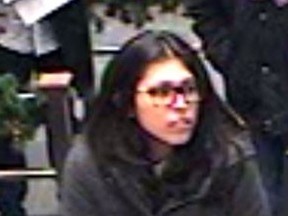 Investigators need help identifying a woman suspected of fraud for using a bank card belonging to someone else to withdraw money from an Innisfil bank on Dec. 9, 2016. (Image supplied by Toronto Police)