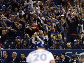 Fans do the wave as Toronto Blue Jays Josh Donaldson 3B (20) is up to bat in the eighth inning in Toronto, Ont. on Friday June 2, 2017. (Jack Boland/Toronto Sun/Postmedia Network)