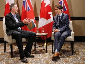 Prime Minister Justin Trudeau meets with Manitoba Premier Brian Pallister in Winnipeg on Saturday, July 29, 2017. THE CANADIAN PRESS/John Woods
