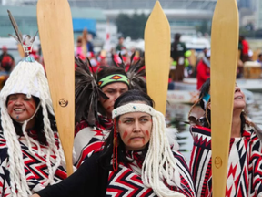 First Nations' gather in False Creek to take part in canoe flotilla event which was part of the Truth and Reconciliation Week in Vancouver, B.C. on Wednesday September 18, 2013. David Ball for Vancouver 24hours/QMI Agency