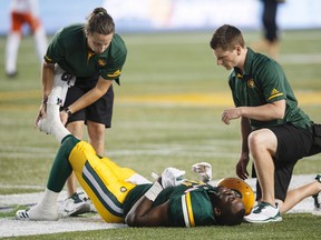 Edmonton Eskimos slotback D'haquille Williams (81) is injured against the B.C. Lions during second half CFL action in Edmonton, Alta., on Friday July 28, 2017.