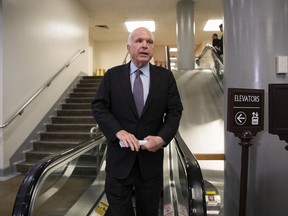 Sen. John McCain, R-Ariz., who returned to Capitol Hill this week after being diagnosed with an aggressive type of brain cancer, smiles as he heads to his office on Capitol Hill in Washington, Thursday, July 27, 2017, while the Republican majority in Congress remains stymied by their inability to fulfill their political promise to repeal and replace "Obamacare." (AP Photo/J. Scott Applewhite)