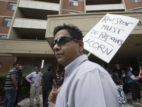 Tenant Mainul Chowdhury protest, along with a few dozen of his fellow tenants, abhorrent conditions at a Realstar building on Denton Avenue in Toronto, on Saturday July 29, for a Sue-Ann Levy Column. 2017. (Stan Behal/Toronto Sun)