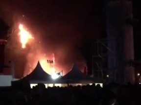 In this screenshot, fire engulfs the stage at the Tomorrowland music festival in Barcelona, Spain on July 29, 2017. (Screenshot/AP Video)