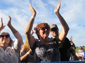 Becky McFadden, left, of Bright's Grove, and Robyn Connolly of Oakville, were in the front row Friday July 28, 2017 for the opening night of Bluewater Borderfest in Centennial Park in Sarnia, Ont. The two-nights of country music concert continues Saturday.