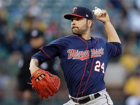 This photo taken July 28, 2017, shows Minnesota Twins pitcher Jaime García working against the Athletics in Oakland. (AP Photo/Ben Margot, File)