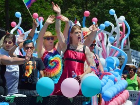 Members of the transgender community on a float in the annual London Pride parade on Queens Avenue in London, Ontario on Sunday July 30, 2017. (MORRIS LAMONT, The London Free Press)