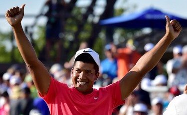 Jhonattan Vegas celebrates his win at the Canadian Open at Glen Abbey in Oakville, Ont., on Sunday, July 30, 2017. (THE CANADIAN PRESS/Frank Gunn)