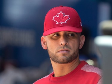 Toronto Blue Jays' Marco Estrada watches the game between the Jays and Los Angeles Angels from the bench, in Toronto on Sunday, July 30, 2017. With the MLB trade deadline tomorrow there is speculation that he may be moved. THE CANADIAN PRESS/Fred Thornhill ORG XMIT: FJT126