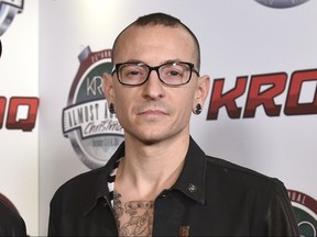 In this Dec. 13, 2014 file photo, Chester Bennington poses in the press room at the 25th annual KROQ Almost Acoustic Christmas in Inglewood, Calif. The Los Angeles County coroner says Bennington, who sold millions of albums with a unique mix of rock, hip-hop and rap, has died in his home near Los Angeles. He was 41. Coroner spokesman Brian Elias says they are investigating Bennington’s death as an apparent suicide but no additional details are available. (Photo by John Shearer/Invision/AP, File)