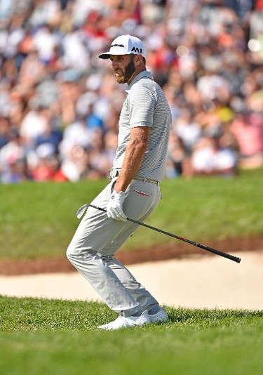 OAKVILLE, ON - JULY 30:  Dustin Johnson of the United States reacts to his putt on the 18th hole during the final round of the RBC Canadian Open at Glen Abbey Golf Club on July 30, 2017 in Oakville, Canada.  (Photo by Minas Panagiotakis/Getty Images)