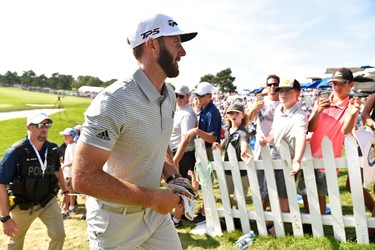 OAKVILLE, ON - JULY 30:  Dustin Johnson of the United States finishes his round on the 18th hole during the final round of the RBC Canadian Open at Glen Abbey Golf Club on July 30, 2017 in Oakville, Canada.  (Photo by Minas Panagiotakis/Getty Images)