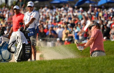 OAKVILLE, ON - JULY 30:  Charley Hoffman of the United States plays his shot out of the bunker during a sudden death playoff during the final round of the RBC Canadian Open at Glen Abbey Golf Club on July 30, 2017 in Oakville, Canada.  (Photo by Minas Panagiotakis/Getty Images)