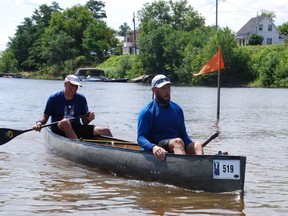 Rob Gregoris, left and Shawn Bruins of Sudbury win the men's rec
A division at the Mattawa River Canoe Race on Saturday. They completed the 64-kilometre event in 6 hours 48 minutes, despite the heat Saturday afternoon.