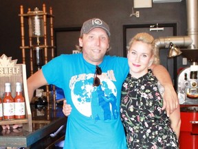 Top Shelf Collection's Josh Lines and Carly McFadden show off their new Front Street Heat hot sauce in Blackwater Coffee, one of 23 locations in Sarnia that feature the hot sauce.
CARL HNATYSHYN/SARNIA THIS WEEK