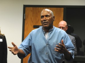 O.J. Simpson reacts after learning he was granted parole at the Lovelock Correctional Center in Lovelock, Nev., on July 20, 2017. (Jason Bean/The Reno Gazette-Journal via AP/Pool)