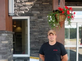 Emil Sochacki stands in front of the yard at the Kanata Hotel where he’s in charge of landscaping. The property won the Communities in Bloom award for commercial and industrial property, tying with Mountain West Services (Jeremy Appel | Whitecourt Star).