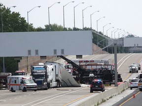 One person was killed after a collision involving three transport trucks on Highway 402 in Sarnia on July 19, 2017. (TYLER KULA, Postmedia Network)