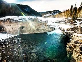 Elbow Falls tumbles over a shelf of rock west of Bragg Creek, Alta.