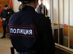 Five defendants at a Moscow courthouse attacked their guards in a bungled escape attempt, leading to a shootout that killed three people. (Dmitry Lovetsky/AP Photo/Files)