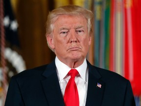 In this July 31, 2017, photo, President Donald Trump pauses during a ceremony in the White House in Washington. (AP Photo/Pablo Martinez Monsivais)