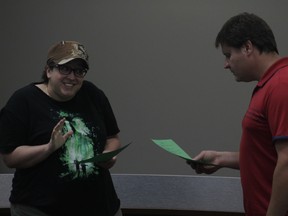 Lani Burzinski (left) acts opposite to Brian Munday during the Pumpjack players auditions on July 26.