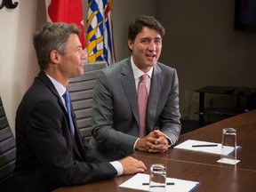 Prime Minister Justin Trudeau and Vancouver mayor Gregor Robertson speak to media before their private meeting in Vancouver, B.C., on Tuesday August 1, 2017. (THE CANADIAN PRESS/Ben Nelms)