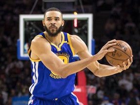 In this Feb. 27, 2017, file photo, Golden State Warriors' JaVale McGee plays during the first half of an NBA basketball game against the Philadelphia 76ers in Philadelphia. McGee will never call himself a journeyman in describing his rugged professional path. Yet McGee must not look far to find an example of someone else who has learned to thrive as a well-traveled NBA role player: just a quick glance a couple of lockers down to where Shaun Livingston dresses each night at Oracle Arena. (AP Photo/Chris Szagola, File)