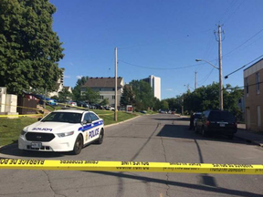 Police cordon off scene where a man was shot near Grenon Avenue on Tuesday afternoon. Source: Lauren Malyk/Postmedia Twitter