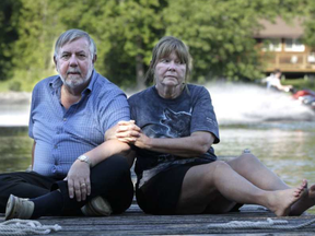 Gail and Peter Allen live on the Rideau River between Manotick and Kars, but are rarely on their dock for fear of tipping over. Their house is on a narrow stretch of the river and the increased boat traffic combined with high water levels from flooding this year is causing wake damage to their dock and property, they say. JULIE OLIVER / POSTMEDIA