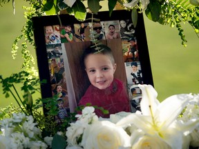 This July 19, 2017 file photo shows a portrait of five-year-old Aramazd Andressian Jr. at a memorial in his memory at the Los Angeles County Arboretum in Arcadia, Calif. Aramazd Andressian Sr. has pleaded guilty to killing his 5-year-old son. Andressian Sr. entered the plea to first-degree murder Tuesday, Aug. 1, 2017 in Los Angeles County Superior Court in Alhambra, Calif. He previously pleaded not guilty to a murder charge and was being held on $10 million bail. (Leo Jarzomb /Los Angeles Daily News via AP, file)
