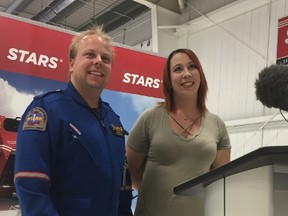 STARS in-flight critical care nurse Tom Millar (left) and Hayley Walker-Ross, the patient he treated in a November 2015 mission, meet for the first time since her accident at a press conference in Winnipeg on Tuesday, Aug. 1, 2017. A quadding accident near Woodridge, Man., left her and her boyfriend seriously injured, with Walker-Ross flown from the scene with a fractured skull and spine after the vehicle flipped pinned on her head. David Larkins/Winnipeg Sun/Postmedia Network